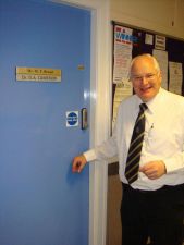 Michael Thomas Broad in front of his office.